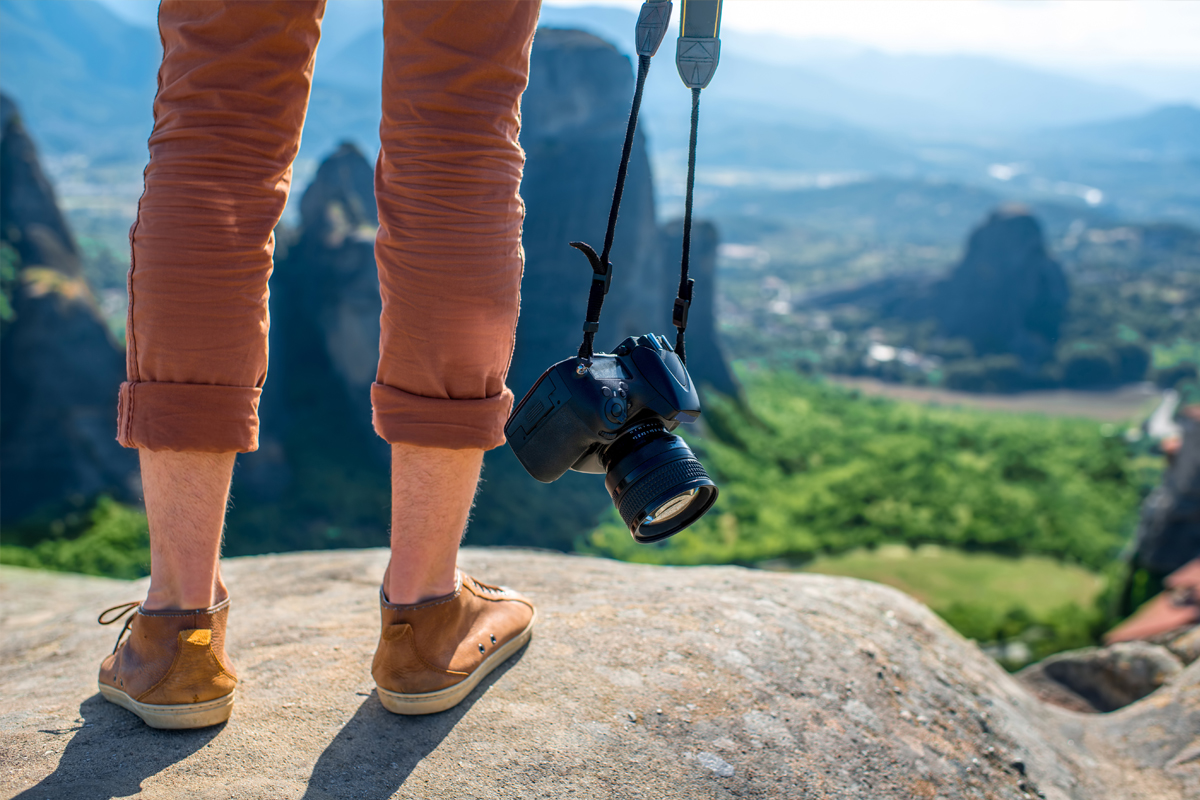 Travel blogger with camera